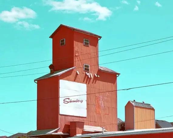 a red building with a sign on it
